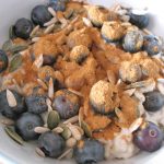 Healthy porridge with seeds and blueberries