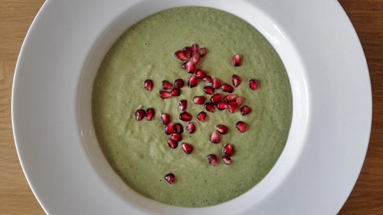 High fibre green smoothie bowl with pomegranate seeds
