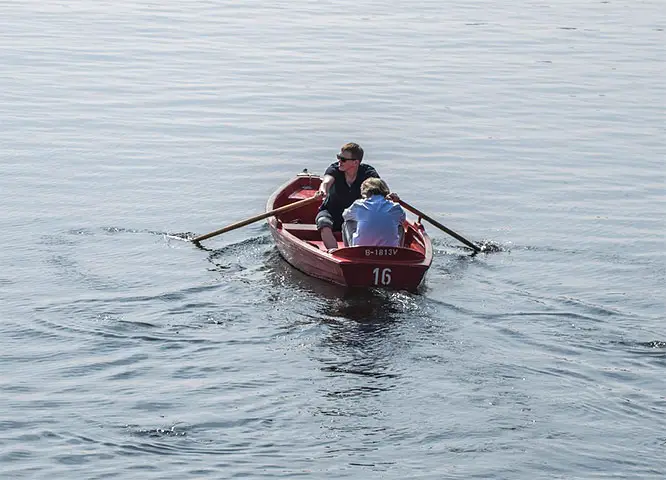 rowing in a boat